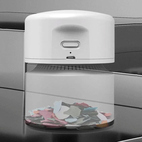Close-up of Mini Desktop Vacuum Showing Ergonomic Design and Controls